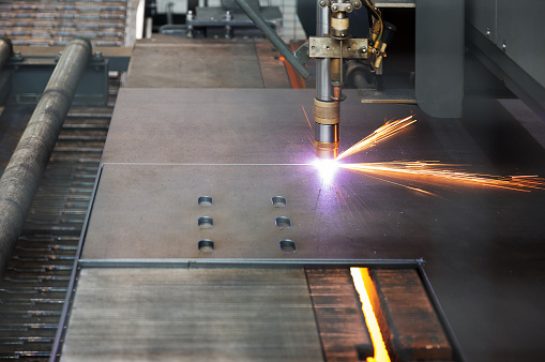 Industrial cnc plasma machine cutting of metal plate and profile